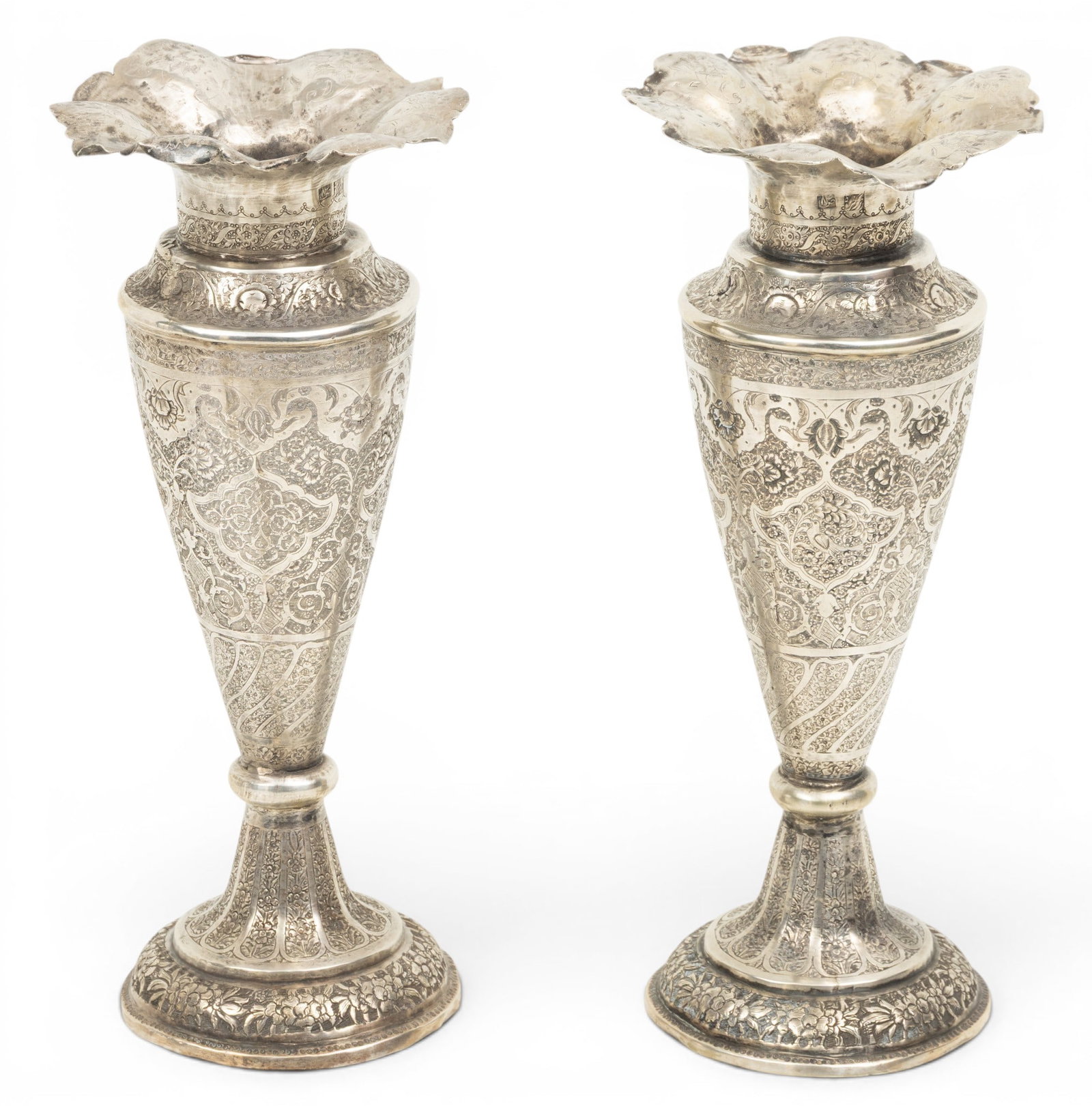 Persian 84 Silver Vases, Ca. Early 20th C., H 9.75" Dia. 4" 21.6 t oz 1 PAIR: Persian 84 Silver Vases, Ca. Early 20th C., H 9.75" Dia. 4" 21.6 t oz 1 PAIR Birds and florals chased pattern. Markings at neck. Provenance: Property from a Clarkston, MI consignor Dimensions: H