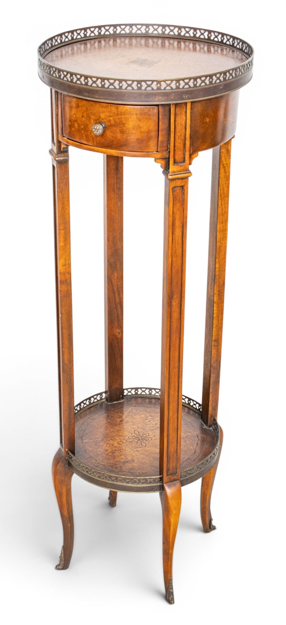 French Walnut Guéridon 1950, H 41" Dia. 14": French Walnut Guéridon 1950, H 41" Dia. 14" With a brass gallery. Fitted with a drawer in the frieze and a lower shelf stretcher. Tooled leather top. Provenance: Property from the Collection of M