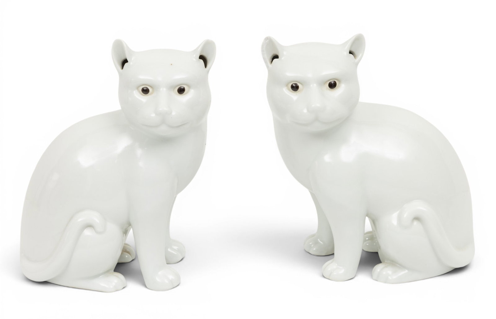 Chinese Porcelain 1900, 'Cats', H 8" 1 PAIR: Chinese Porcelain 1900, 'Cats', H 8" 1 PAIR Glazed white with black eyes, circa 1900. Provenance: Property from the Collection of Marianne Endicott, Grosse Pointe Shores, MI Dimensions: H 8" 1 PAIR