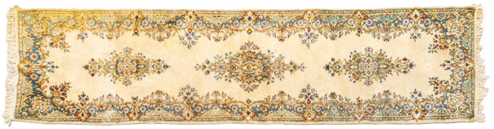 Persian Kerman Hand Woven Wool Runner 1950, W 2' 4" L 9' 7": Persian Kerman Hand Woven Wool Runner 1950, W 2' 4" L 9' 7" Ivory/cream ground with three floral medallions and conforming border. Provenance: Property from the collection of Margarat Weerakoon,