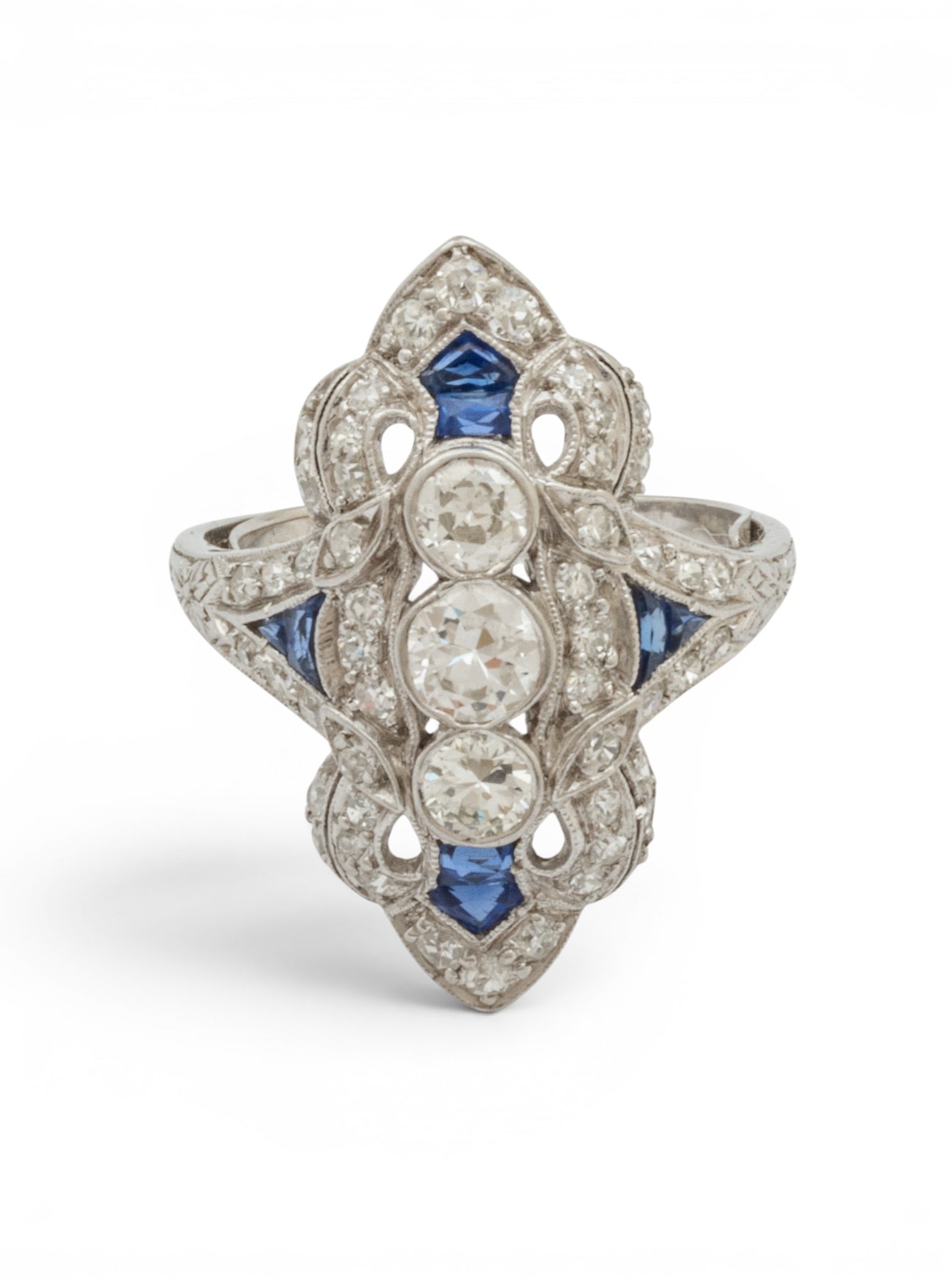 Diamond and Blue Sapphire Platinum Ring Size 6 1/2 1920, 7 grams 1 PC: Diamond and Blue Sapphire Platinum Ring Size 6 1/2 1920, 7 grams 1 PC One bezel set diamond approximately 4.57mm x 2.54mm weighing approximately .34ct of SI clarity, J color and good proportions. Two 