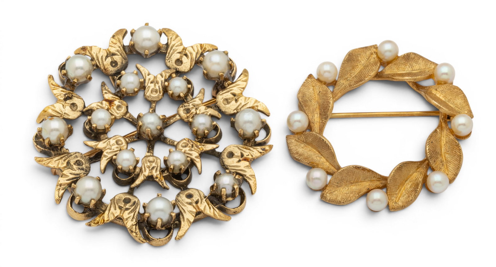 14kt Yellow Gold Brooches Set with Pearls, 15 grams 2 PCS: 14kt Yellow Gold Brooches Set with Pearls, 15 grams 2 PCS Lot includes: One 34.5mm diameter yellow gold brooch. Bell flower designs accented with pearls. Marked on the backside 14kt. 10 grams. O