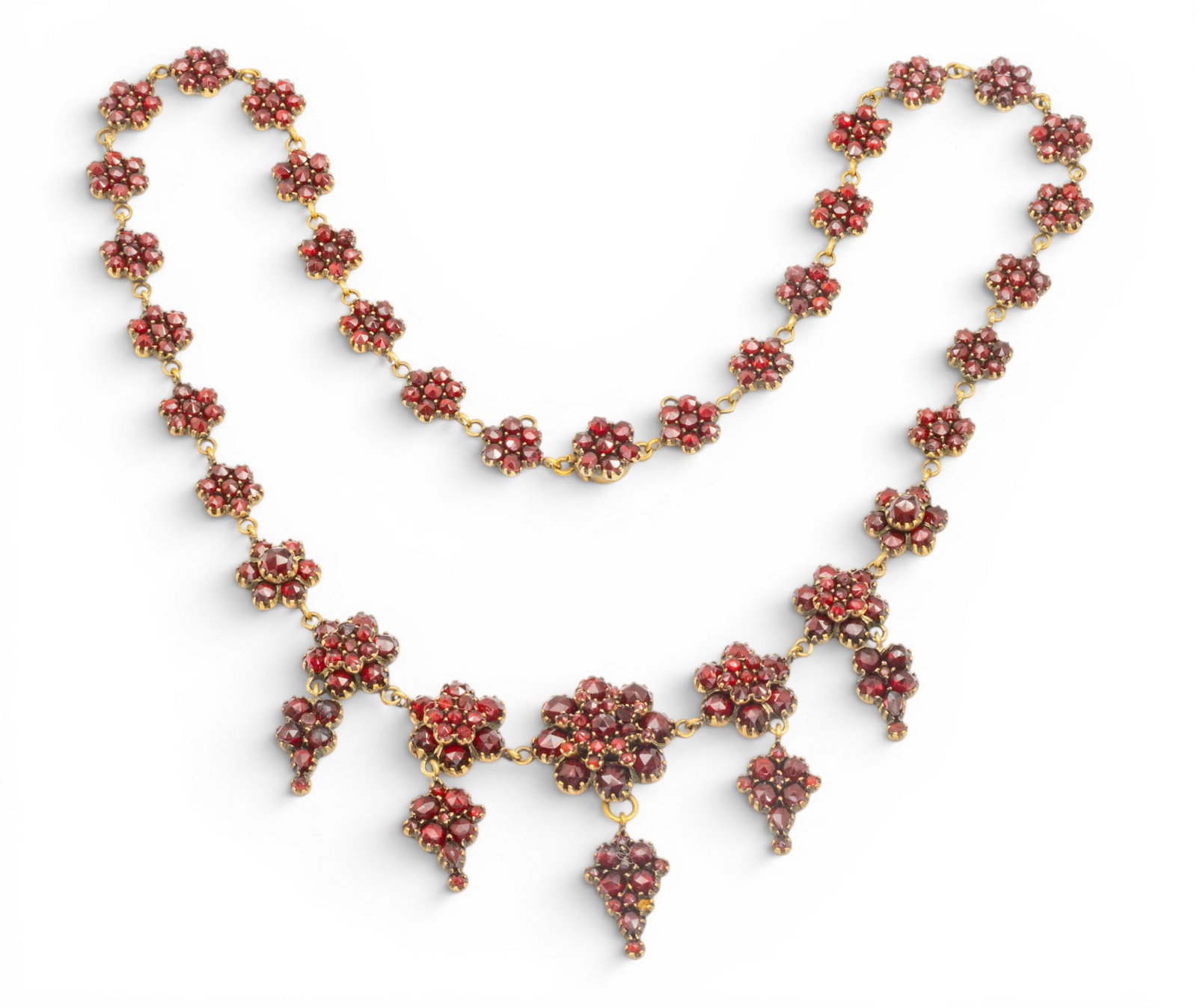 Bohemian Garnet Necklace 1930, L 17" 25 grams 1 PC: Bohemian Garnet Necklace 1930, L 17" 25 grams 1 PC Carefully made with clusters of flower forms and five center drops. Provenance: Property of a Northville, MI private collector. Dimensions: L 17" 25 