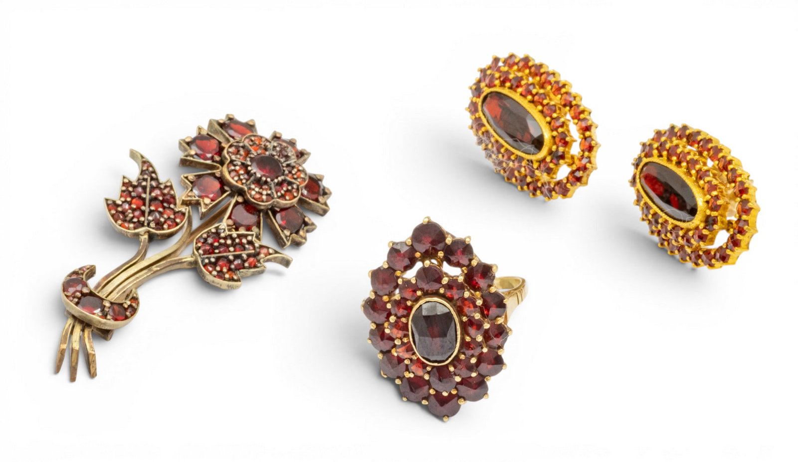 Bohemian Garnet Earrings, Brooch and Ring 14 grams 4 PCS: Bohemian Garnet Earrings, Brooch and Ring 14 grams 4 PCS Brooch, earrings and lady's ring. Brooch is flower form and intricate L 1.7" and circa 1930. Ring is size 4. Provenance: Property of a No