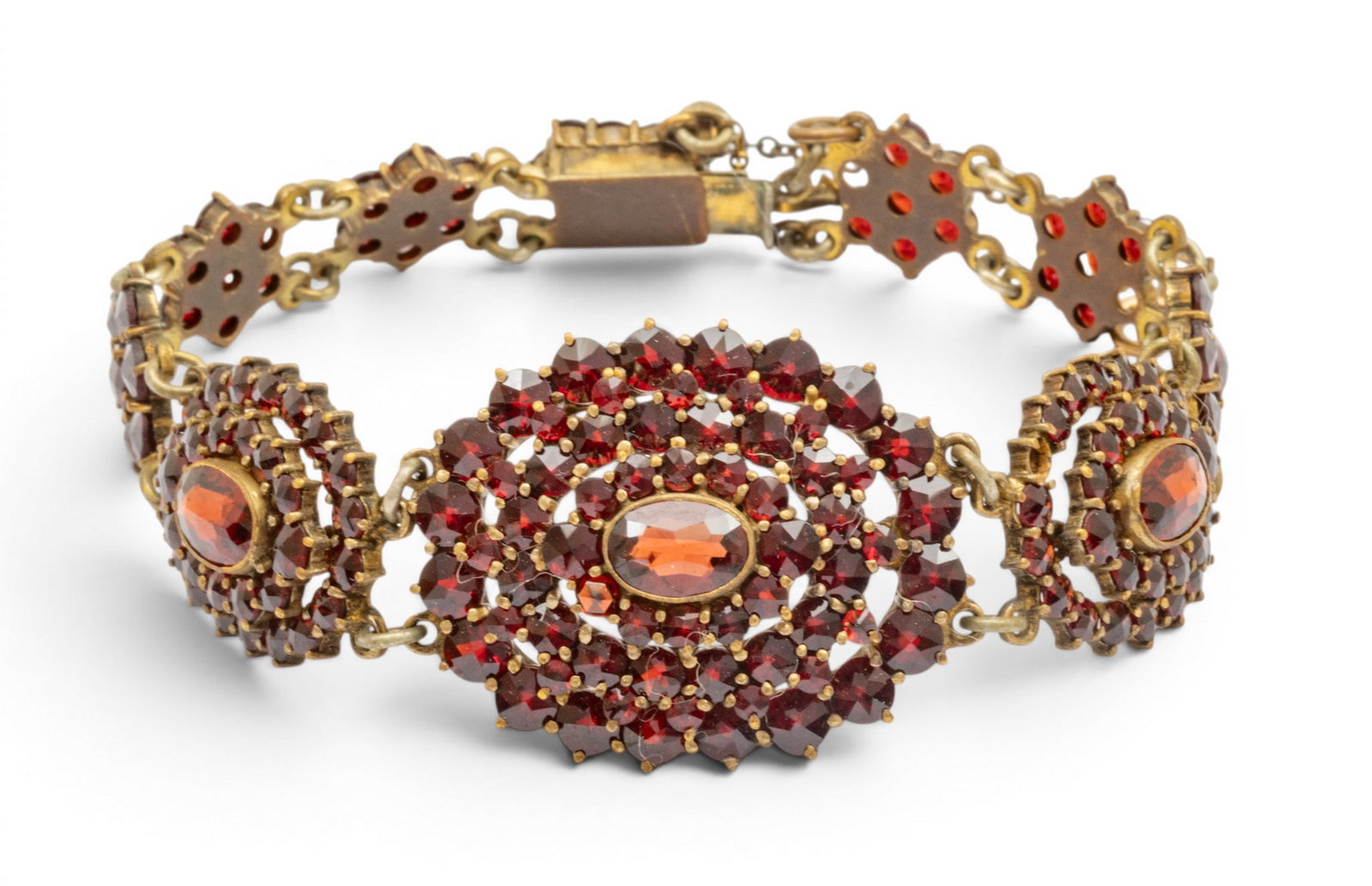 Bohemian Garnet Bracelet 1930, L 6.5" 16 grams 1 PC: Bohemian Garnet Bracelet 1930, L 6.5" 16 grams 1 PC Very detailed and carefully made. Garnets are well matched. Provenance: Property of a Northville, MI private collector. Dimensions: L 6.5" 16 