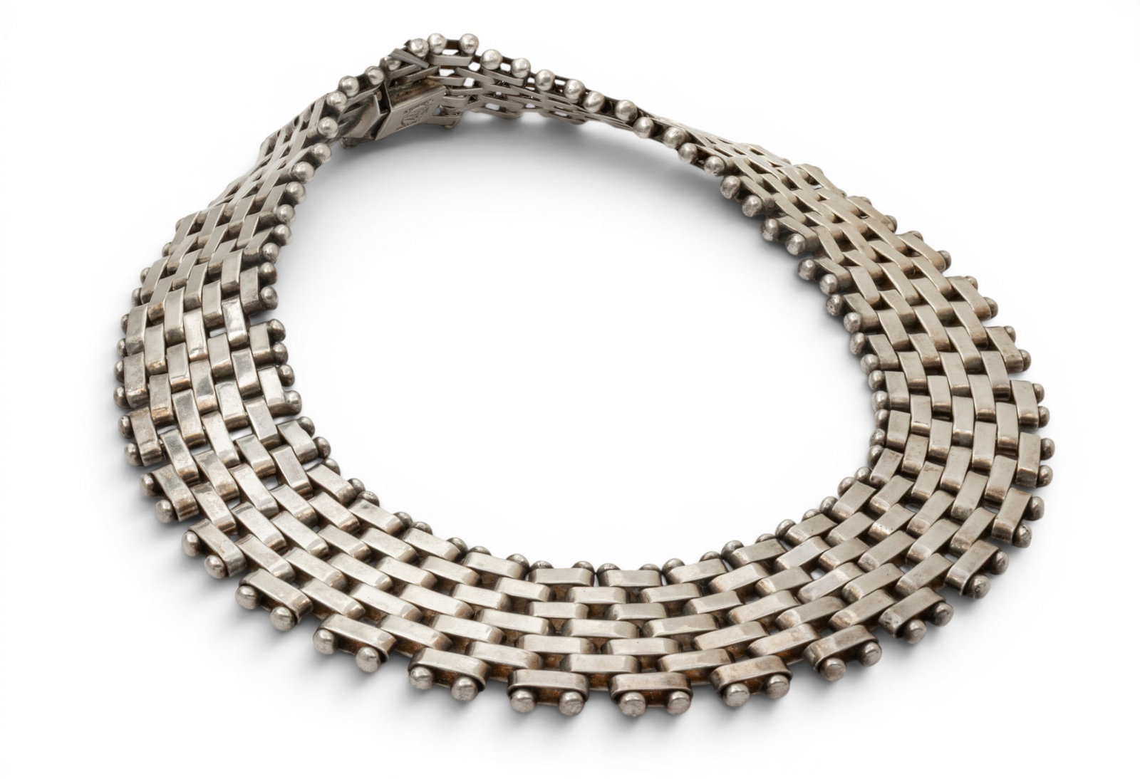 Taxco Mexico Sterling Silver Necklace W 1.2" L 16" 248 grams 1 PC: Taxco Mexico Sterling Silver Necklace W 1.2" L 16" 248 grams 1 PC Seven rows of bars with beads at edges. Expertly made. Provenance: Property from a Traverse City, MI private collector Dimensions: W 1