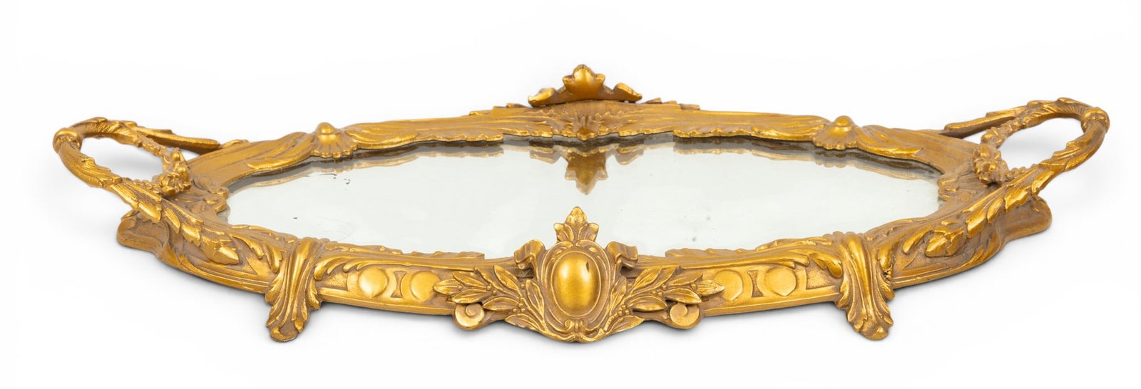French Cast Bronze Table Mirror 1900, H 2" W 8" L 16" 1 PC: French Cast Bronze Table Mirror 1900, H 2" W 8" L 16" 1 PC Oval, footed tabletop mirror plateau. Finely cast frame with wreath form handles. High quality. Wood under panel. Provenance: Pro