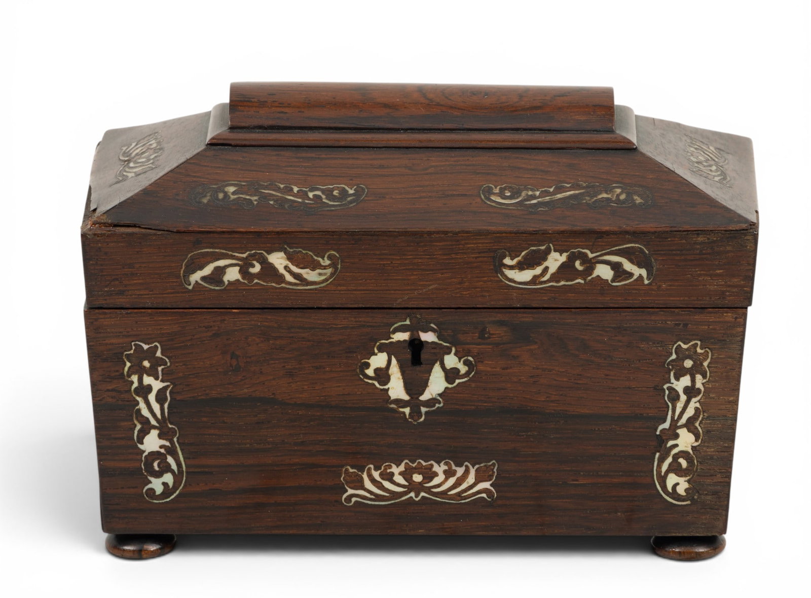 English Rosewood Tea Caddy, Mother of Pearl Inlay H 6" W 5" L 9": English Rosewood Tea Caddy, Mother of Pearl Inlay H 6" W 5" L 9" Raised on feet. Hinged cover opens to interior two tea wells with covers. Provenance: Property of a Bloomfield Hills, MI private 