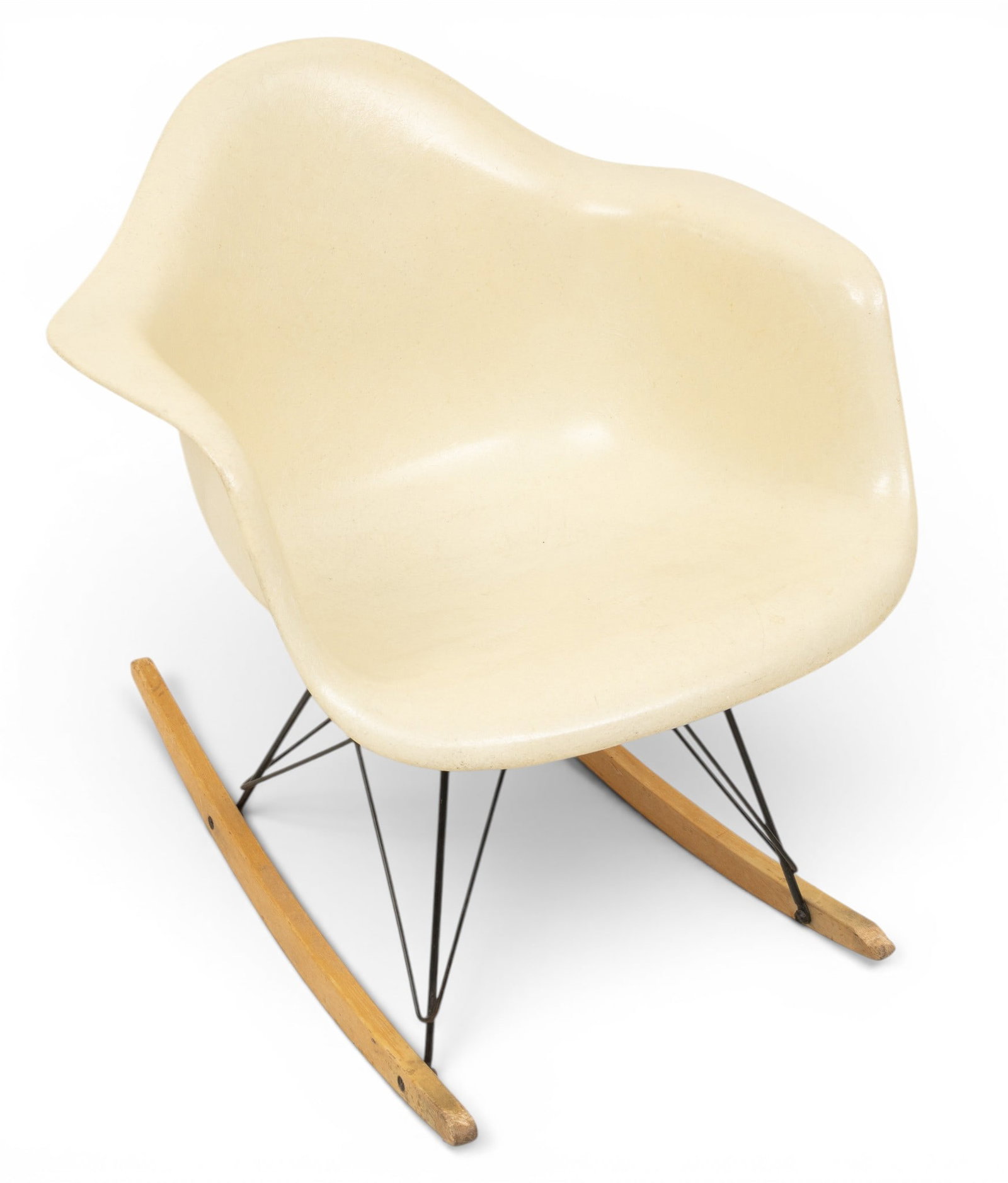 Charles and Ray Eames for Herman Miller (American) Molded Fiberglass RAR Rocking Arm Chair in: Charles and Ray Eames for Herman Miller (American) Molded Fiberglass RAR Rocking Arm Chair in Parchment, Ca. 1960, H 27" W 25" Depth 21" A molded fiberglass shell with steel base and birch runner.&nbs