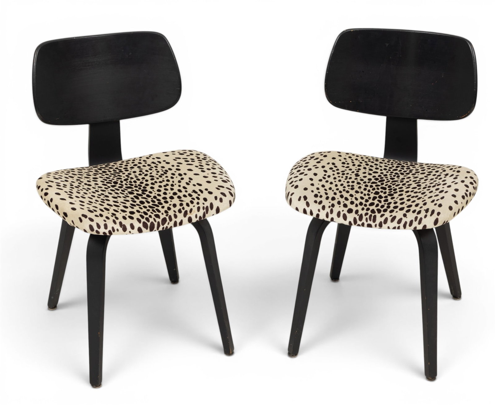 Thonet Chairs with Leopard Print, Ca. 1960, H 30.5" W 18.75" Depth 19.5" 1 PAIR: Thonet Chairs with Leopard Print, Ca. 1960, H 30.5" W 18.75" Depth 19.5" 1 PAIR Having leopard print upholstered seats and black painted frames. Thonet tag to underside of seat. Dimensions: H 30.5" W 