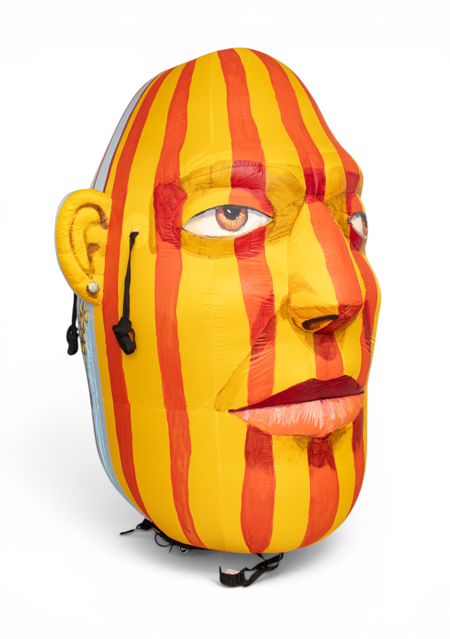 Frank Hyder (American, B. 1951) Inflatable and Book 'Janis Head', H 87" Dia. 65": Frank Hyder (American, B. 1951) Inflatable and Book 'Janis Head', H 87" Dia. 65" Hand painted inflatable nylon head. One side painted yellow and red. One side painted blue and red. Referencing the Moa