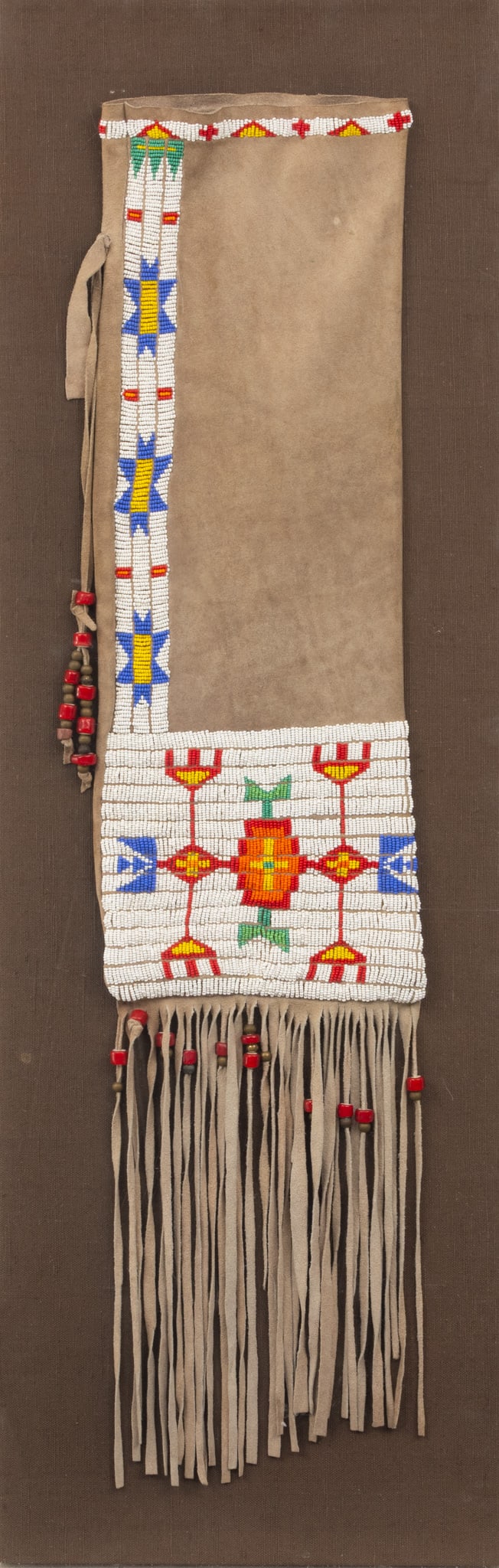 Native American, Great Plains Region, Hide and Glass Bead Bandolier Bag 20th C., H 34" W 8" (1 of 3)
