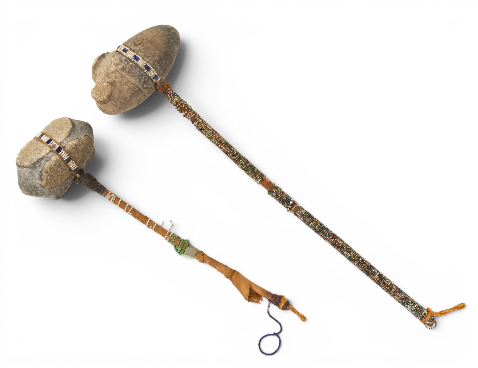 Native American, Plains Regions, Stone, Wood, and Beadwork War Clubs. H. 15"-21", W. 5"-6" 2 PCS (1 of 3)