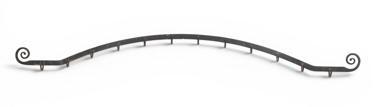 Wrought Iron Coat Rack/ Meat Hook H 7" L 72" Depth 2.5": Wrought Iron Coat Rack/ Meat Hook H 7" L 72" Depth 2.5" Having 12 hooks, scrolling terminals. Provenance: Property from a prominent Detroit, MI collector of architectural items of historical significa