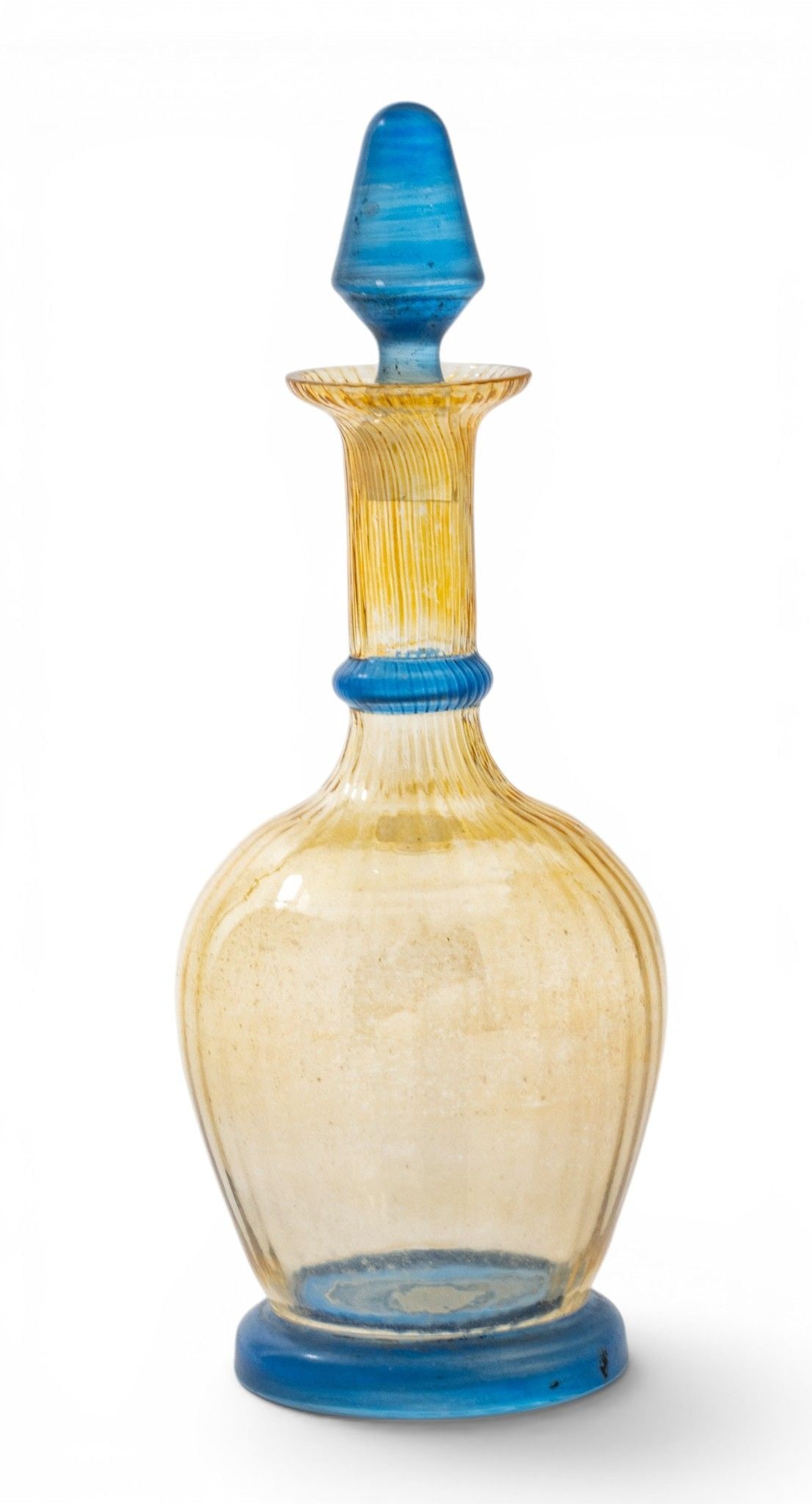 Bohemian Hand Blown Art Glass Decanter, Ca. Mid 20th C., H 8.5" Dia. 3.25": Bohemian Hand Blown Art Glass Decanter, Ca. Mid 20th C., H 8.5" Dia. 3.25" Acid etched mark on the underside Made in Czechoslovakia. Ribbed design in yellowish-brown with blue bands and a blue st