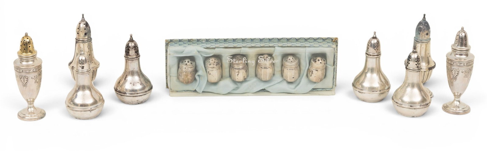 Sterling Silver Salt and Pepper Shakers 12 PCS: Sterling Silver Salt and Pepper Shakers 12 PCS (1.) A group of four Wallace sterling silver salt and pepper shakers. Marked Wallace / Sterling / 241. (2.) A pair of Mueck-Carey sterling silver pe