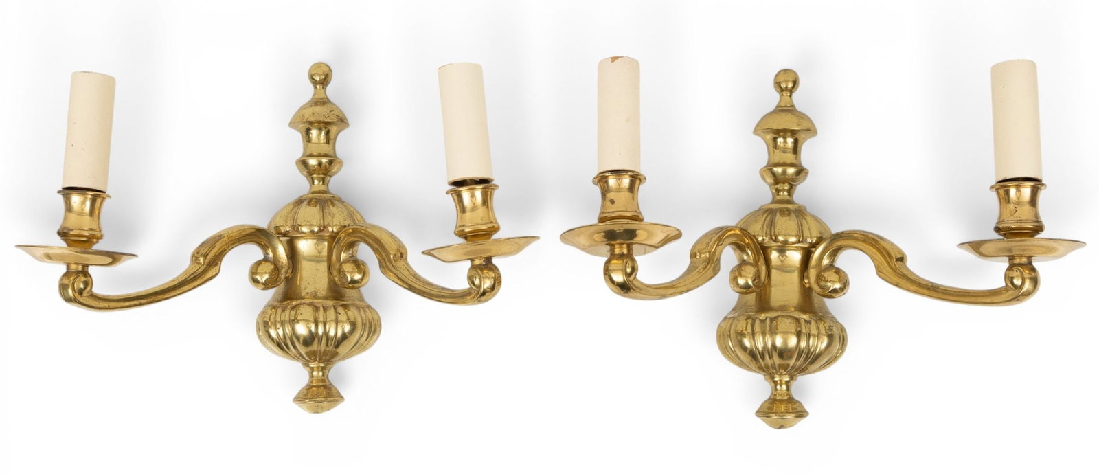 Colonial Style Brass Two Light Wall Sconces 20th C., H 11" W 12" 1 PAIR: Colonial Style Brass Two Light Wall Sconces 20th C., H 11" W 12" 1 PAIR Electrified. Provenance: Property from the collection of Toby Jones, Bloomfield Hills, MI Dimensions: H 11" W 12" 1 PAIR