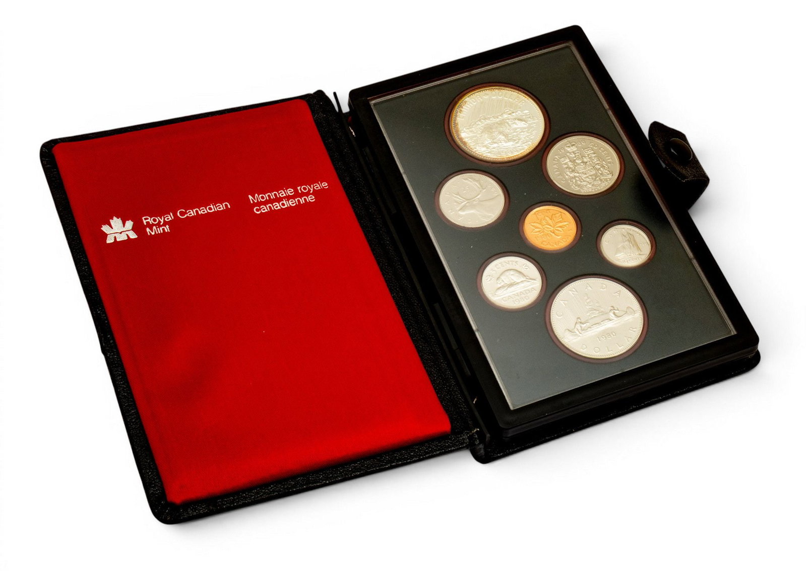 Canadian Proof Set 1980, W 6" L 4" 1 SET: Canadian Proof Set 1980, W 6" L 4" 1 SET In black leather case with red silk interior. Seven coins Provenance: Property of a Northville, MI private collector. Dimensions: W 6" L 4" 1 SET