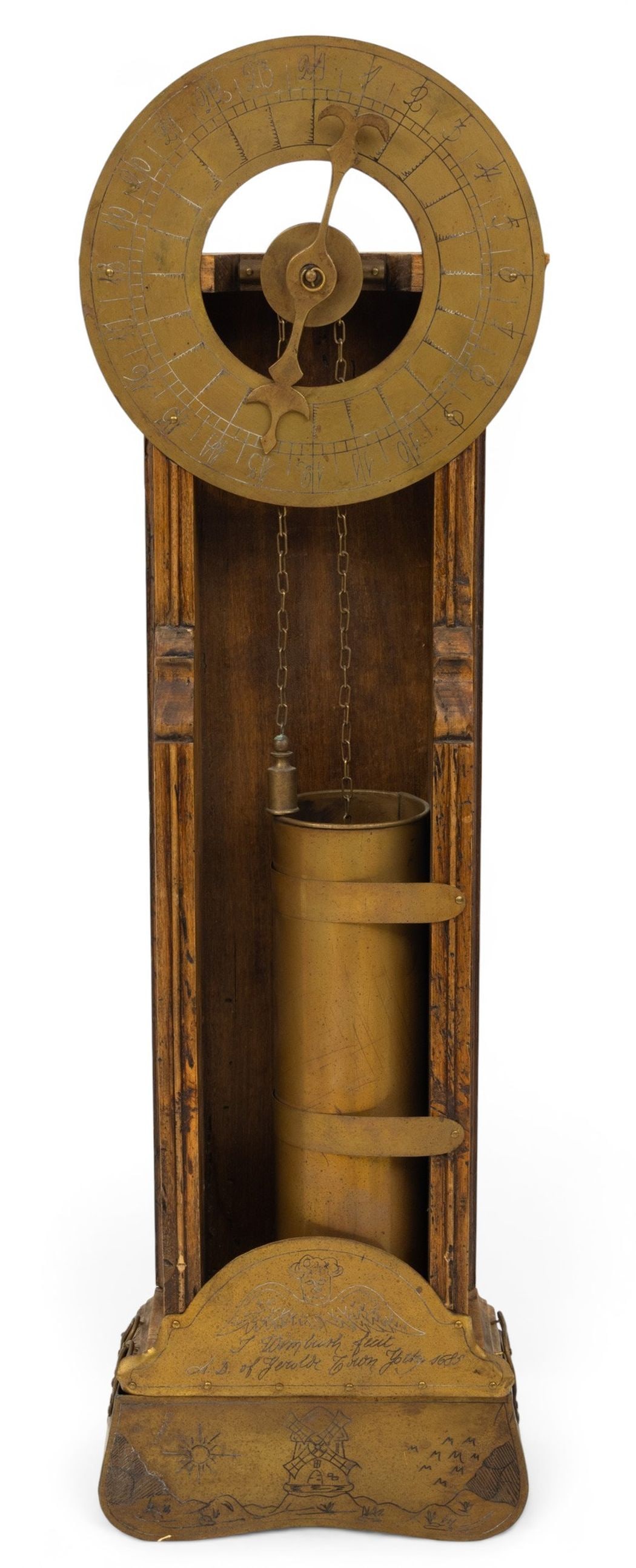 Brass and Wood Waterclock H 33.25" W 9.75" Depth 4.25": Brass and Wood Waterclock H 33.25" W 9.75" Depth 4.25" With a windmill landscape scene. Modern replica of a wall mounted water clock. Provenance: Southeast Michigan private collector. Literature