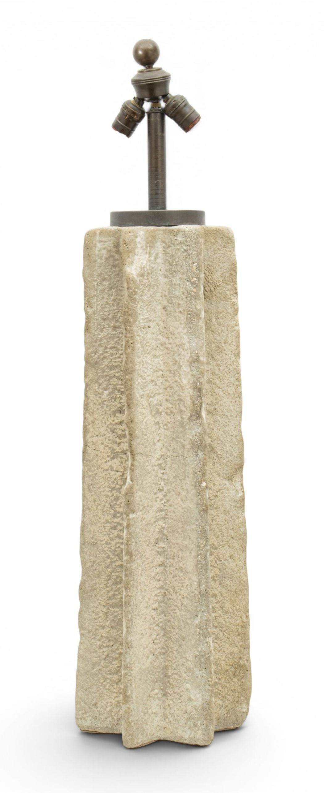 Attributed to Ron Mann (California) Cast Stone Table Lamp, 20th C., H 37" W 9" L 9": Attributed to Ron Mann (California) Cast Stone Table Lamp, 20th C., H 37" W 9" L 9" Unmarked. Cast stone in a tapered ribbed design. Electrified with two sockets, toggle power switch on the cord. 