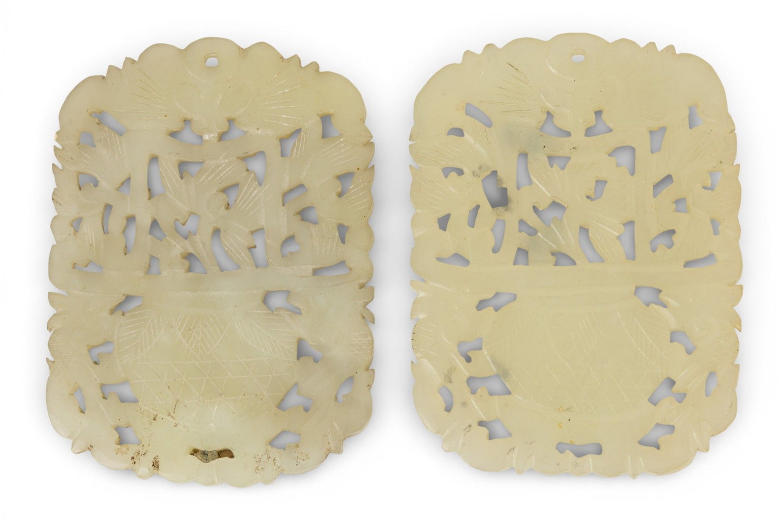 Chinese Carved Jade Pendants, Ca. 1900, H 3" W 2" 72 grams 2 PCS: Chinese Carved Jade Pendants, Ca. 1900, H 3" W 2" 72 grams 2 PCS Light green color. Carefully carved jardinières with flowers. Provenance: Property of a Prominent Grosse Pointe, MI Collector Di
