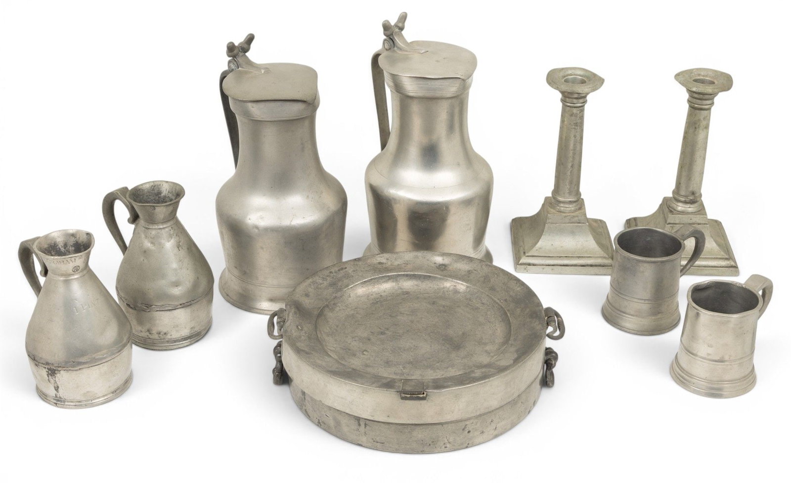 Pewter Table Accessories 19th C., 10 PCS: Pewter Table Accessories 19th C., 10 PCS Includes (1.) A pair of English warming dishes, English hallmarks. (2.) A pair of Irish early 19th C. one pint jugs by Austen & Son. (3.) A pair of h