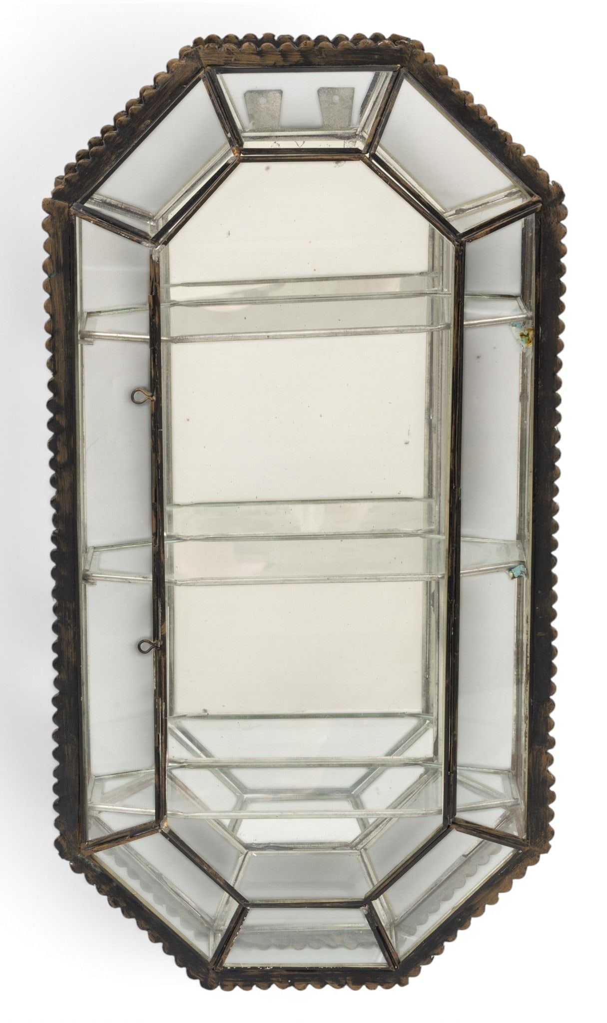 Spain, Metal Vitrine with Mirrored Back 1960, H 25" W 13" Depth 3" 1 PC: Spain, Metal Vitrine with Mirrored Back 1960, H 25" W 13" Depth 3" 1 PC Purchased in Rochester, Minnesota, H 24", W 13". Three interior shelves. Provenance: Property from the Collection of Marianne En