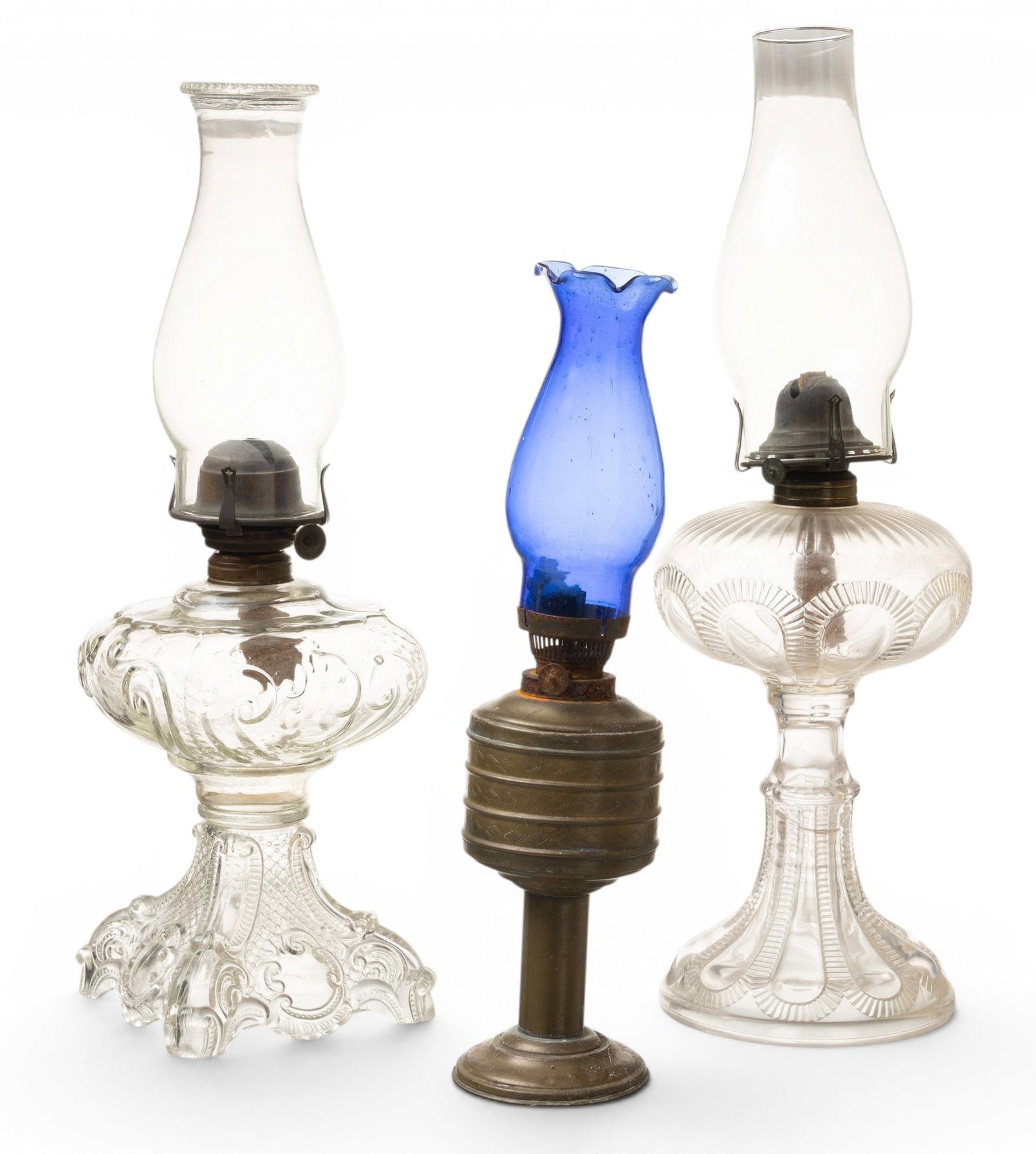 Glass Oil Lamps 19th.c., H 20" 3 PCS: Glass Oil Lamps 19th.c., H 20" 3 PCS Two @ 20". One @ 15" with brass base and blue glass globe. Provenance: Property of a Bloomfield Hills, MI private collector. Dimensions: H 20" 3 PCS