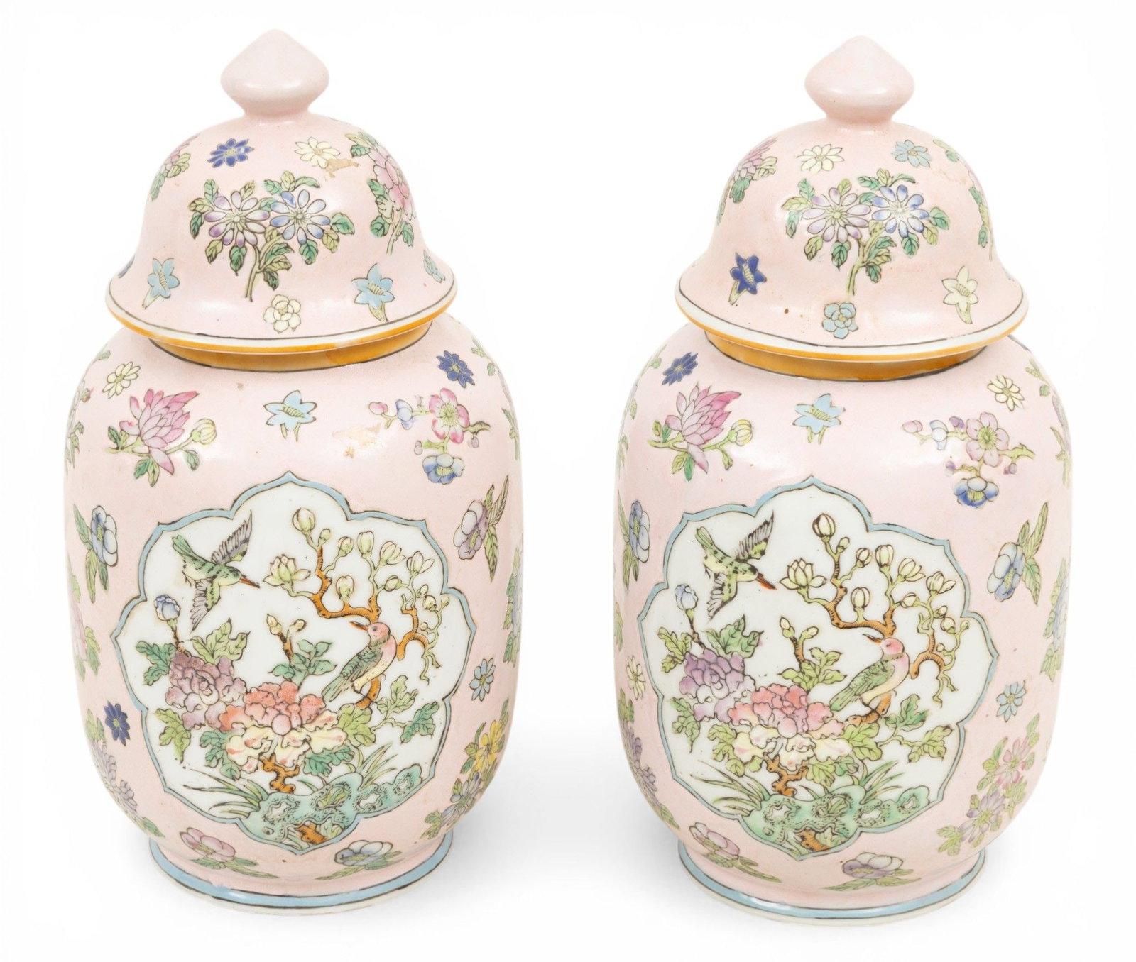 Chinese Covered Porcelain and Enameled Jars Mid 20th C., H 12.5" Dia. 5.75" 1 PAIR: Chinese Covered Porcelain and Enameled Jars Mid 20th C., H 12.5" Dia. 5.75" 1 PAIR Having a pink ground decorated with flowers and bird motif. Jiaqing reign mark on base. Provenance: Property of a Gro