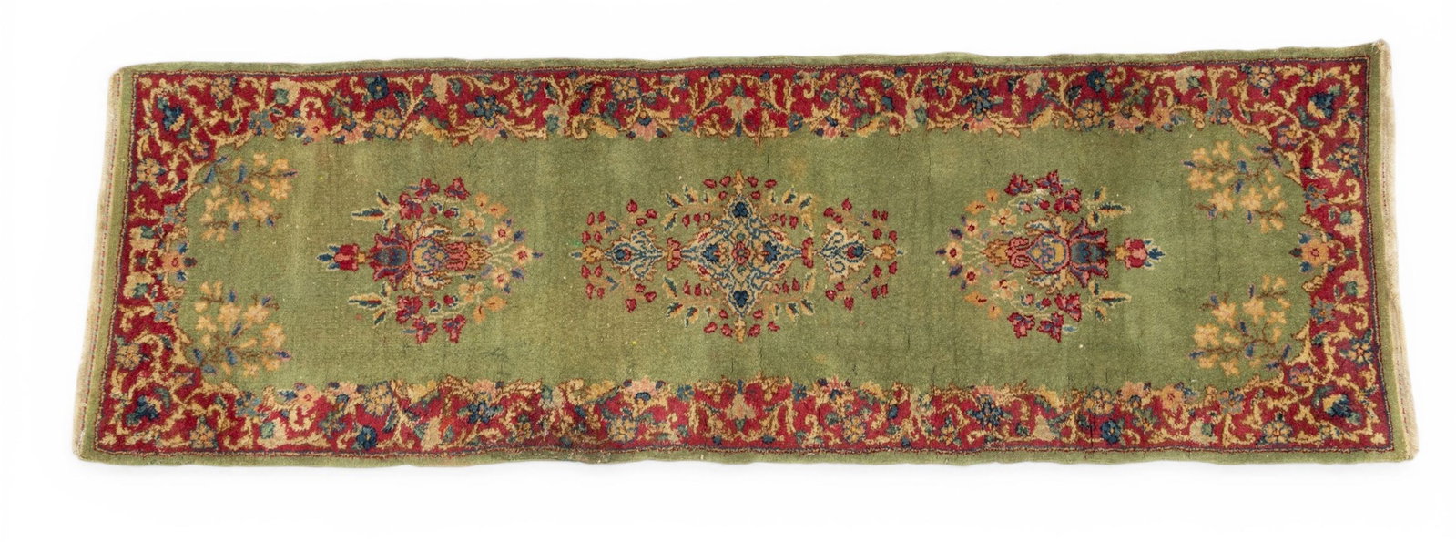 Persian Kerman Hand Woven Wool Small Runner, Ca. 1920, H 4' 9" W 1' 6": Persian Kerman Hand Woven Wool Small Runner, Ca. 1920, H 4' 9" W 1' 6" Having emerald green ground with center field of floral sprays emerging from geometric urns. Floral border. Provenance: Pro