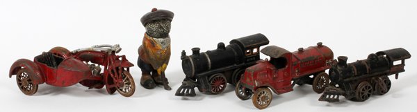 CAST IRON TOY TRAINS, GOLFER, ETC. EARLY 20TH C: CAST IRON TOY TRAINS, GOLFER, ETC., EARLY 20TH C, 5 PC S.:includes one Bing toy train engine, one unmarked train engine, motorcycle with side car, gasoline tank truck, golfer.