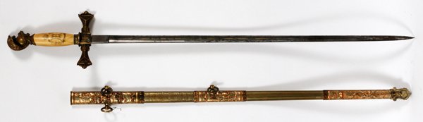 KNIGHTS OF COLUMBUS CEREMONIAL SWORD L28" BLADE: KNIGHTS OF COLUMBUS CEREMONIAL SWORD, EARLY 20TH C, L 28" BLADE:having an ivory hilt with brass inlaid cross and engraved crown and "H", knights helmet pommel, brass cross guard, double edge blade wit