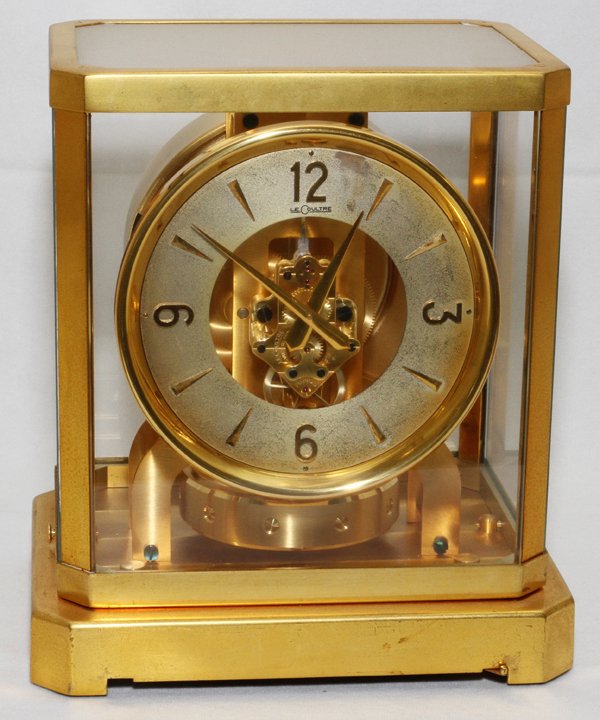 LE COULTRE BRASS ATMOS CLOCK, H 9", W 8 1/2": LE COULTRE BRASS ATMOS CLOCK, H 9", W 8 1/2", D 6 1/2":Perpetual motion.