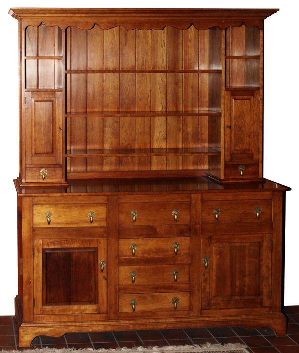 LEOPOLD STICKLEY CHERRY HUTCH, 1962, H 80": LEOPOLD STICKLEY CHERRY HUTCH, 1962, H 80", W 68", D 20":Beveled cornice above open shelves, two doors and two drawers, the base fitted with an arrangement of six drawers and two cabinet doors, raised