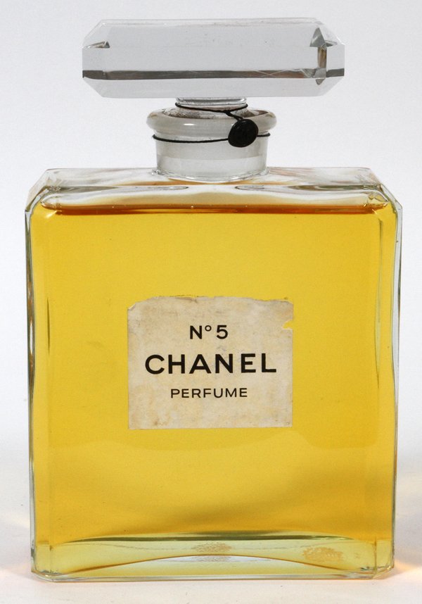 CHANEL NO. 5 COLOGNE DISPLAY PERFUME BOTTLE: CHANEL NO. 5 COLOGNE DISPLAY PERFUME BOTTLE, H 8 1/2", L 5 3/4", D 2 1/4":With seal.
