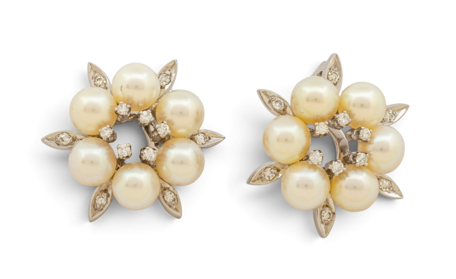 14k White Gold, Pearl, and Diamond Ear Clips H 1.125" 14.3 grams 1 PAIR: 14k White Gold, Pearl, and Diamond Ear Clips H 1.125" 14.3 grams 1 PAIR A pair of 14k white gold pearl and diamond ear clips having six appx. .03ct round, brilliant diamonds, six appx. .02ct single cu