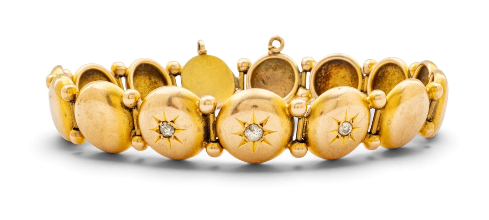 14K Yellow Gold Link Bracelet, Ca. 1940, L 6.5" 13 grams 1 PC: 14K Yellow Gold Link Bracelet, Ca. 1940, L 6.5" 13 grams 1 PC Fifteen links, three of which have star set, appx. .03ct old European cut accent diamonds. No gold marks. Gold electronically tests as 14k