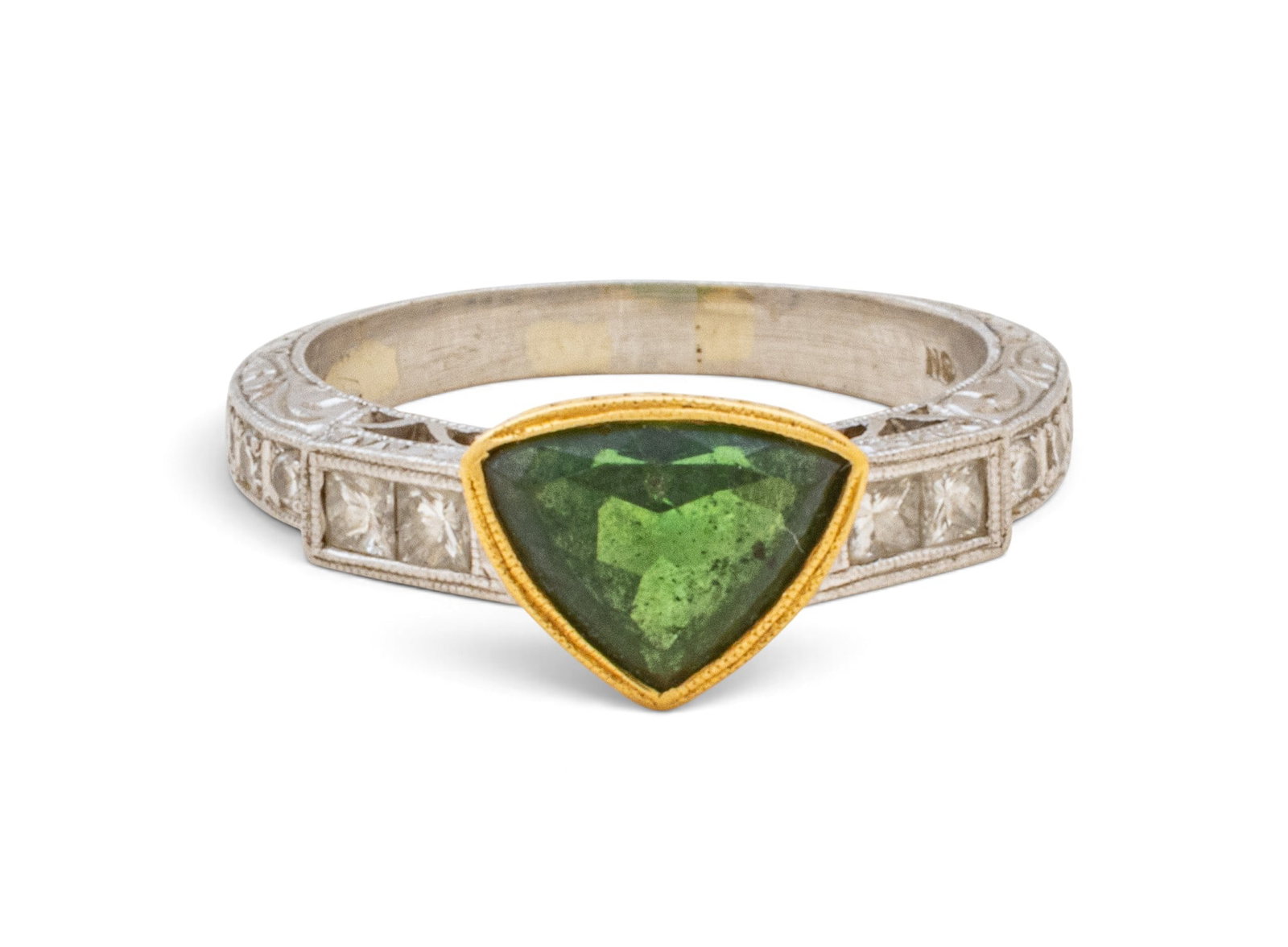 Platinum and 18k Yellow Gold, Chrome Tourmaline and Diamond Ring, Size 7 1/2, Ca. 1930, 7 grams 1 PC: Platinum and 18k Yellow Gold, Chrome Tourmaline and Diamond Ring, Size 7 1/2, Ca. 1930, 7 grams 1 PC A triangular modified brilliant cut, central, green chrome tourmaline (appx. 7 x 9.2 x 4.5 mm) flan
