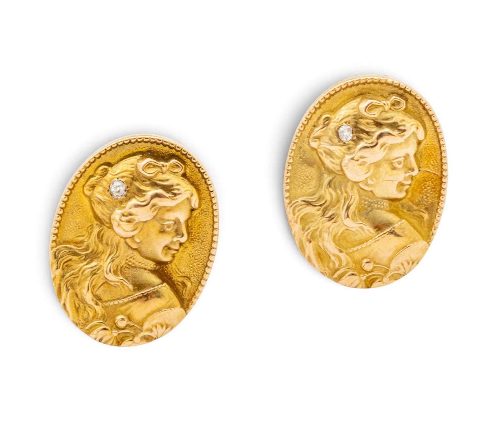 14K Yellow Gold Clip-on Earrings, Cameo Style H 0.7" 3 grams 1 PAIR: 14K Yellow Gold Clip-on Earrings, Cameo Style H 0.7" 3 grams 1 PAIR Oval with beaded edge and profiles of women. Diamond accents. Impressed 14K gold. Dimensions: H 0.7" 3 g 1 PAIR Weight: 3 gram