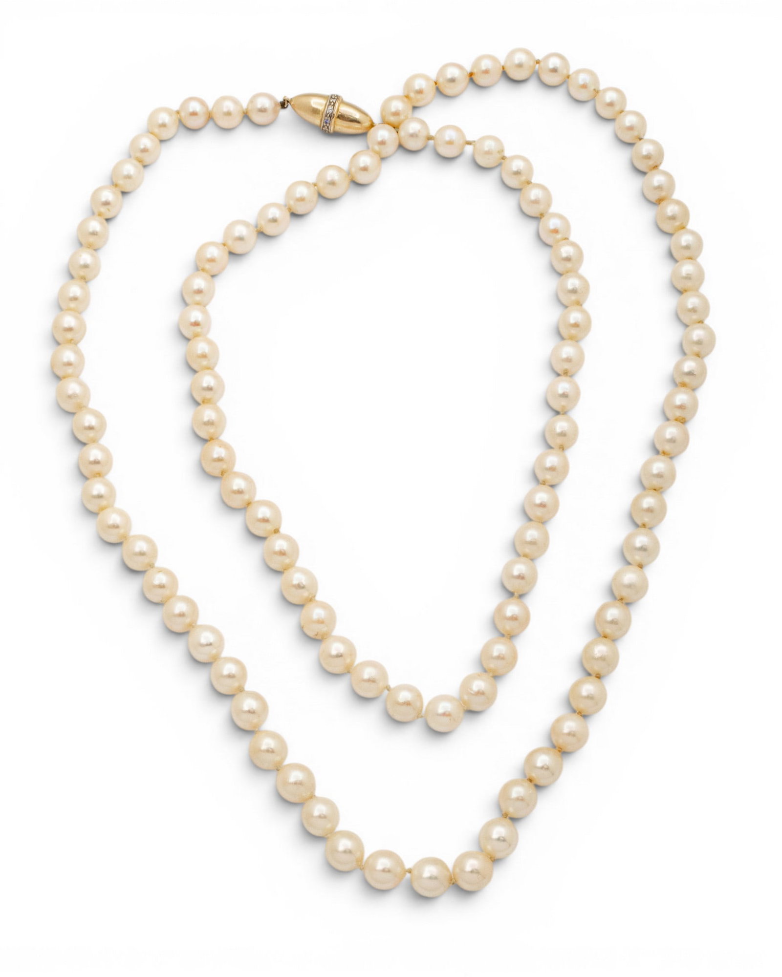14k Yellow Gold and Diamond Clasp, Cultured Akoya Pearl Necklace L 36" 71.1 grams: 14k Yellow Gold and Diamond Clasp, Cultured Akoya Pearl Necklace L 36" 71.1 grams Opera length cultured Akoya pearl necklace having a 14k yellow gold threaded clasp with round, brilliant diamond melee