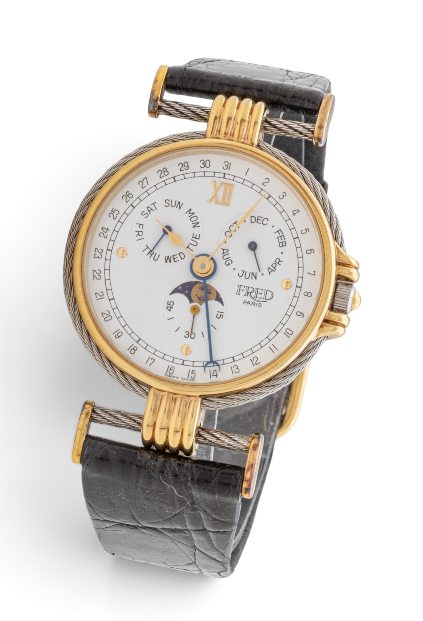 Fred Paris (Joaillier) (French, Est. 1936) Force 10 Reversible Moonphase 18K White and Yellow Gold: Fred Paris (Joaillier) (French, Est. 1936) Force 10 Reversible Moonphase 18K White and Yellow Gold Wristwatch 1980, Dia. 31mm Two tone case with yellow gold and white gold cable style bezel and lugs. 