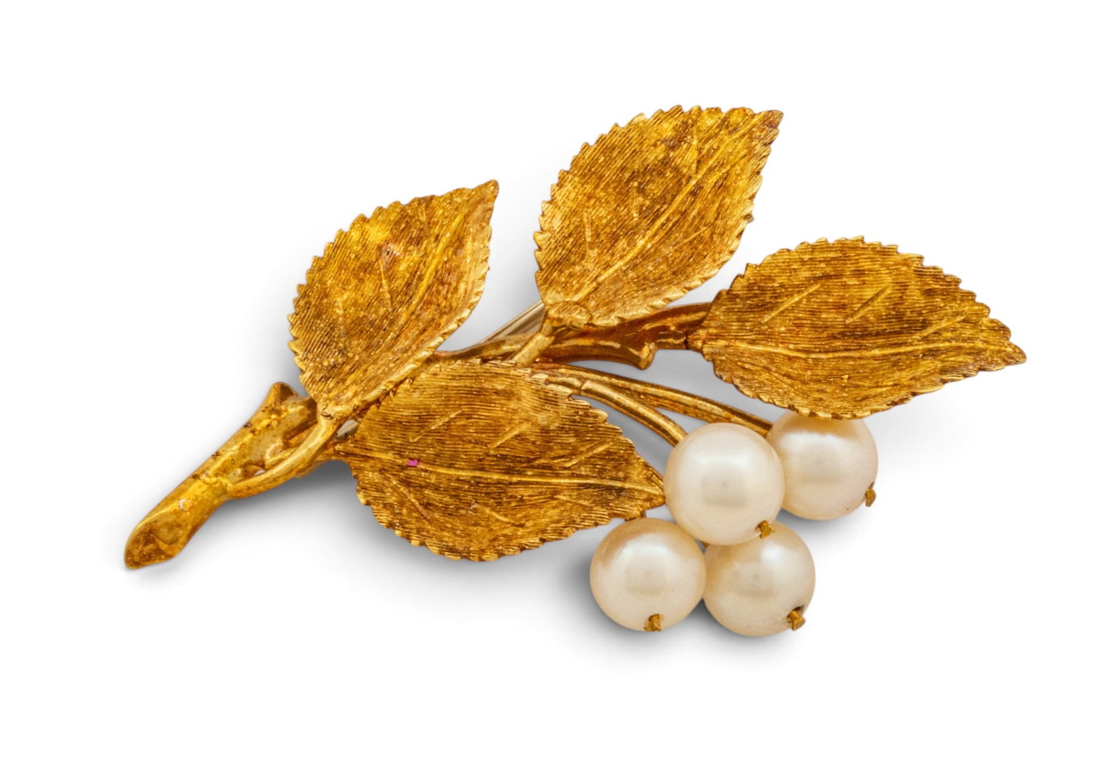 18k Yellow Gold Leafy Brooch with Pearls H 1.7" 7.3 grams 1 PC: 18k Yellow Gold Leafy Brooch with Pearls H 1.7" 7.3 grams 1 PC Four pearls are approximately 5mm. Impressed 750. Four leaves are bright gold and delineated. Provenance: Property from a Farmingto