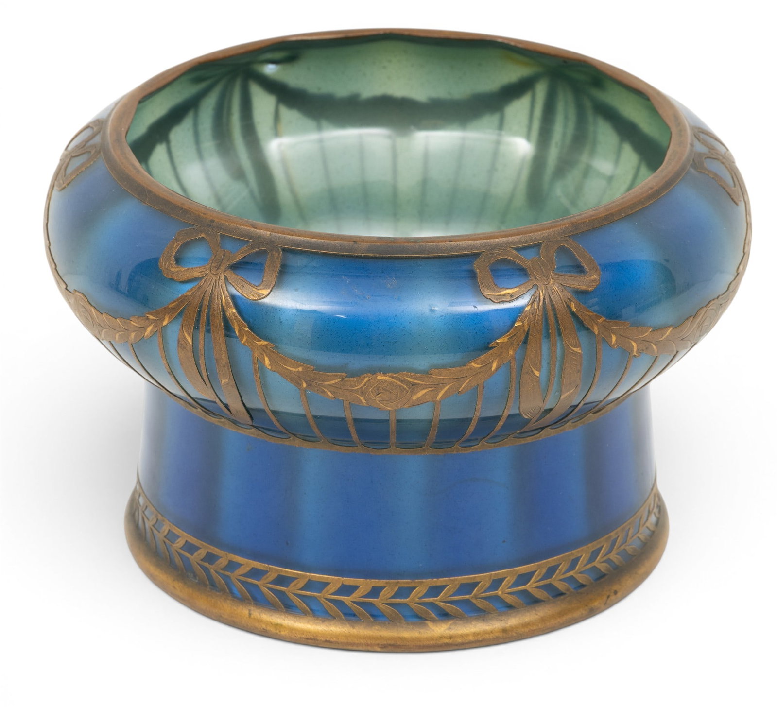 French Blue Enamel on Blown Glass Centerpiece, Bronze Overlay 1920, H 4.7" Dia. 7.5": French Blue Enamel on Blown Glass Centerpiece, Bronze Overlay 1920, H 4.7" Dia. 7.5" Round centerpiece with bulbous form over straight base. Fine bronze inlaid ribbons and floral swags. Bronze rim at 