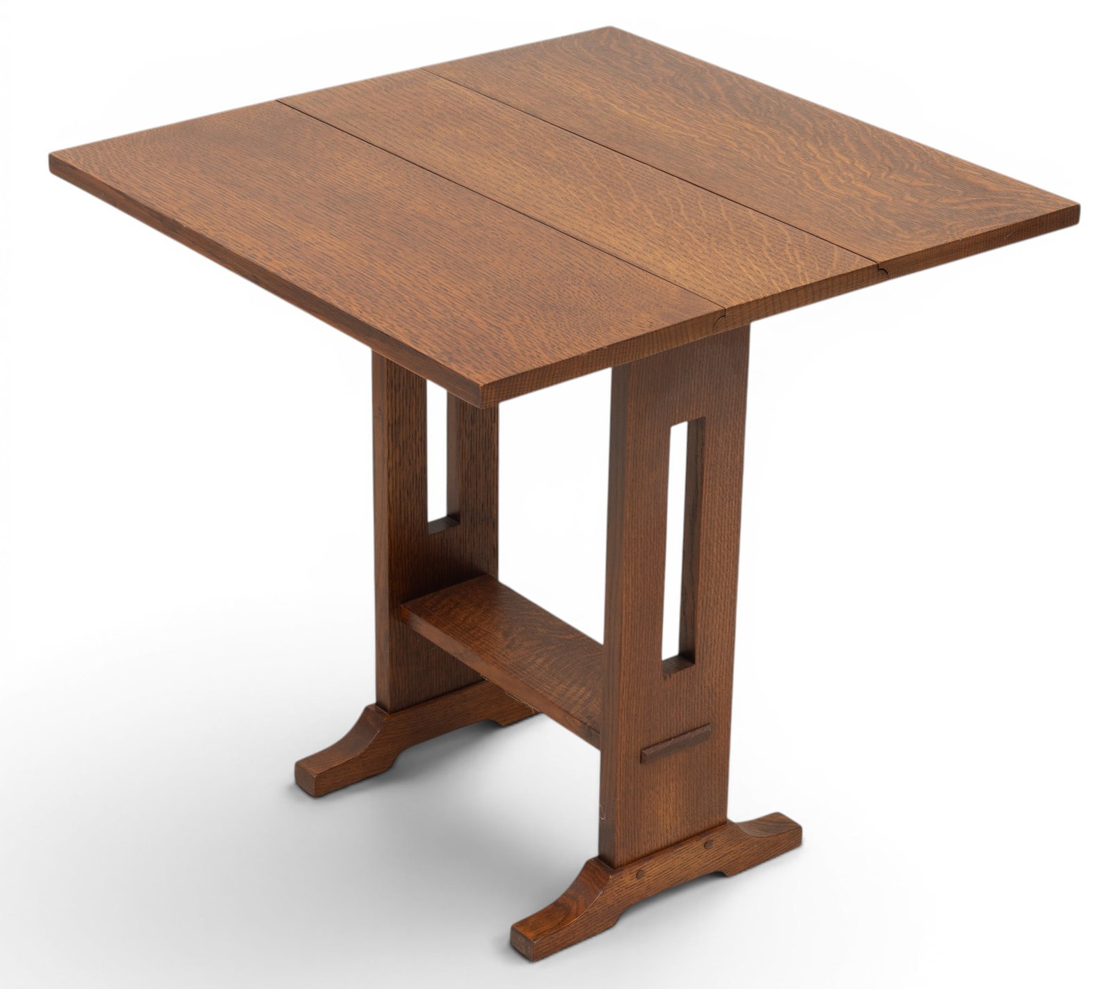 Stickley (American) Mission Style Oak Drop-Leaf Table H 24.5" W 7.5" Depth 24" 1 PC: Stickley (American) Mission Style Oak Drop-Leaf Table H 24.5" W 7.5" Depth 24" 1 PC Quarter sawn oak, rectangular tops with hinged drop leaves, raised on pierced supports with stretcher base terminati