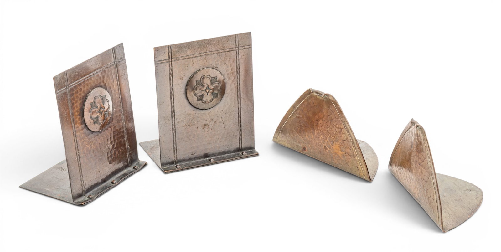 Roycroft (American) Arts and Crafts Hand Hammered Copper Bookends, Ca. Early 20th C., H 5" W 4" 2: Roycroft (American) Arts and Crafts Hand Hammered Copper Bookends, Ca. Early 20th C., H 5" W 4" 2 PAIRS 5" X 4" rectangular bookends. Each bookend has the orb-and-cross trademark. Also triangular pair