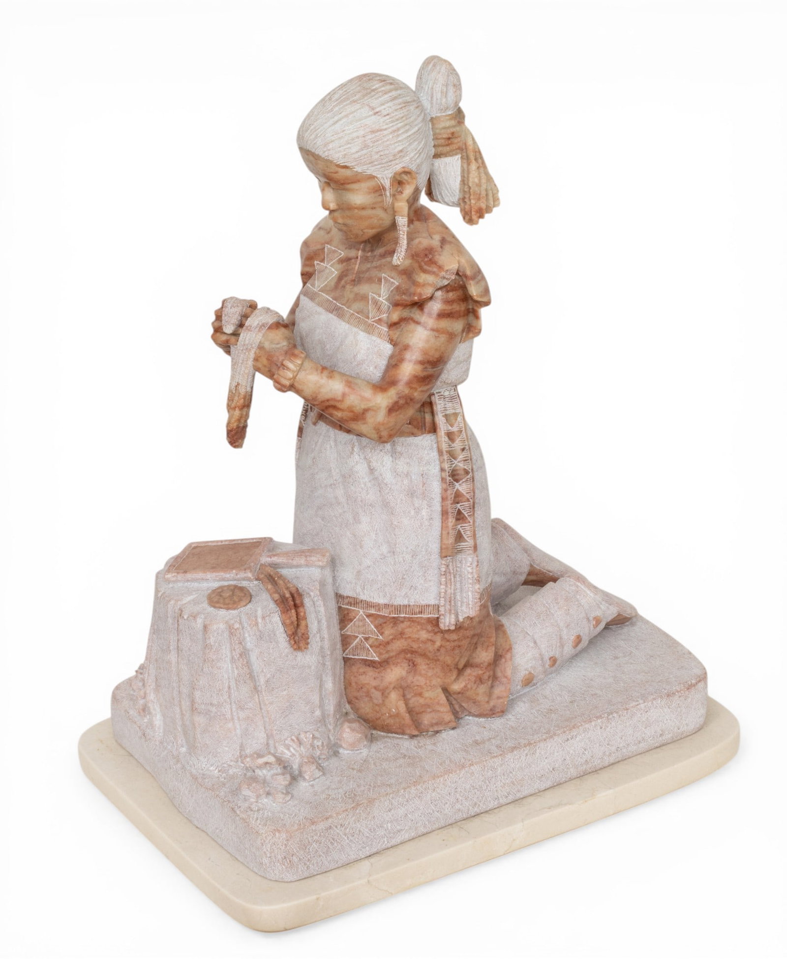 Oreland C Joe Sr., CA (American, Navajo Culture, Diné, B. 1958) Carved Alabaster Sculpture C.: Oreland C Joe Sr., CA (American, Navajo Culture, Diné, B. 1958) Carved Alabaster Sculpture C. 2003, H 18.5'' W 10.5'' L 14.5'' Depicting a woman kneeling before a table with mirror and accessorie
