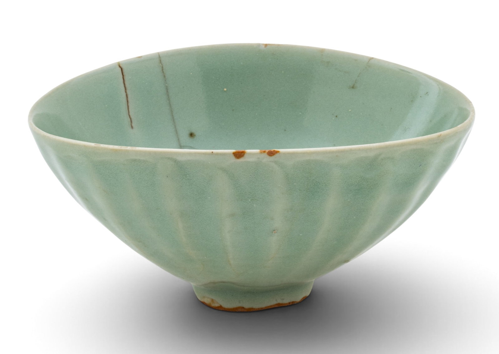 Chinese Celadon Longguan Porcelain Lotus Bowl 18th.c., H 3" Dia. 6": Chinese Celadon Longguan Porcelain Lotus Bowl 18th.c., H 3" Dia. 6" Short socle foot. Homogenous glaze. Provenance: Property from the Estate Collection of Catherine Mayhew, Bloomfield Hills, MI 