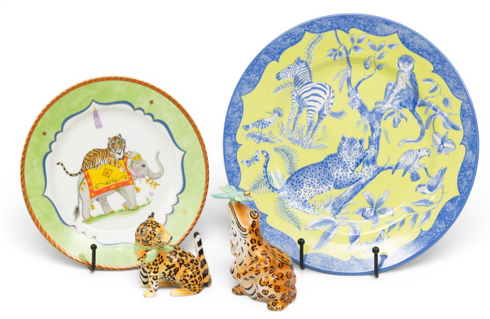 Lynn Chase Jungle Porcelain "Tiger Raj" 4 PCS: Lynn Chase Jungle Porcelain "Tiger Raj" 4 PCS Tiger Raj porcelain plate Tiger riding on elephant's back Dia. 8" green border. Blue and green African animals 11" plate depicting zebra, monkey, leopard,