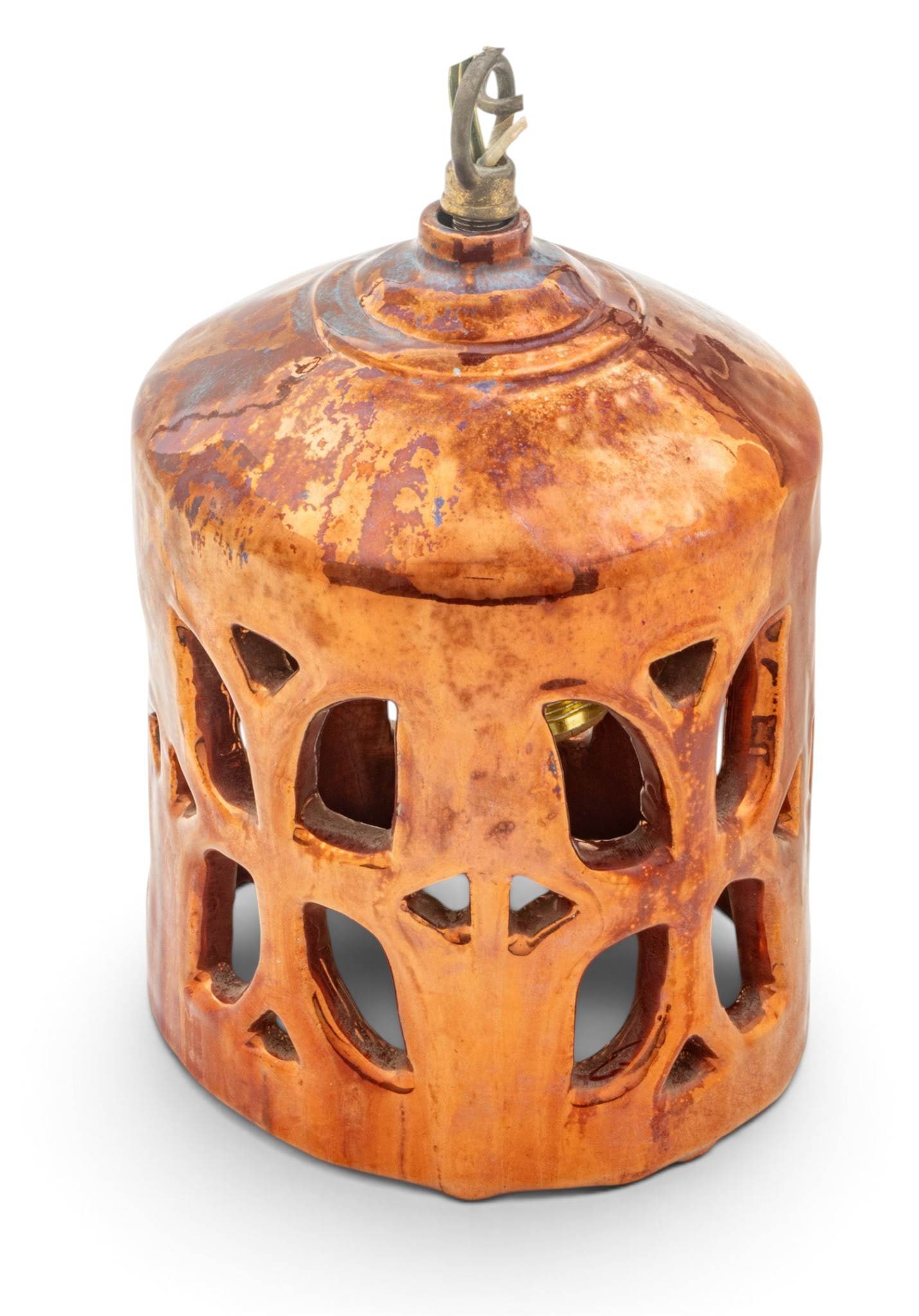 Ira and Ella Peters for Pewabic Pottery (Detroit, Est. 1903) Copper Glaze with Reduction Hanging: Ira and Ella Peters for Pewabic Pottery (Detroit, Est. 1903) Copper Glaze with Reduction Hanging Lantern, Ca. 1970's, H 7" Dia. 5" A pierced hanging pottery lantern with copper glaze with reduction. N
