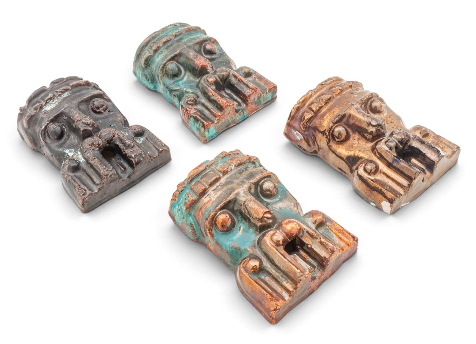 Pewabic Pottery (Detroit, Est. 1903) Glazed Earthenware Babylonian Masks 1990, H 7.5" W 5.5" Depth: Pewabic Pottery (Detroit, Est. 1903) Glazed Earthenware Babylonian Masks 1990, H 7.5" W 5.5" Depth 3" Two with iridescent copper and Persian Blue glaze on white clay body. One with copper glaze. One w